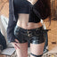 Raven Belted Faux-Leather Shorts