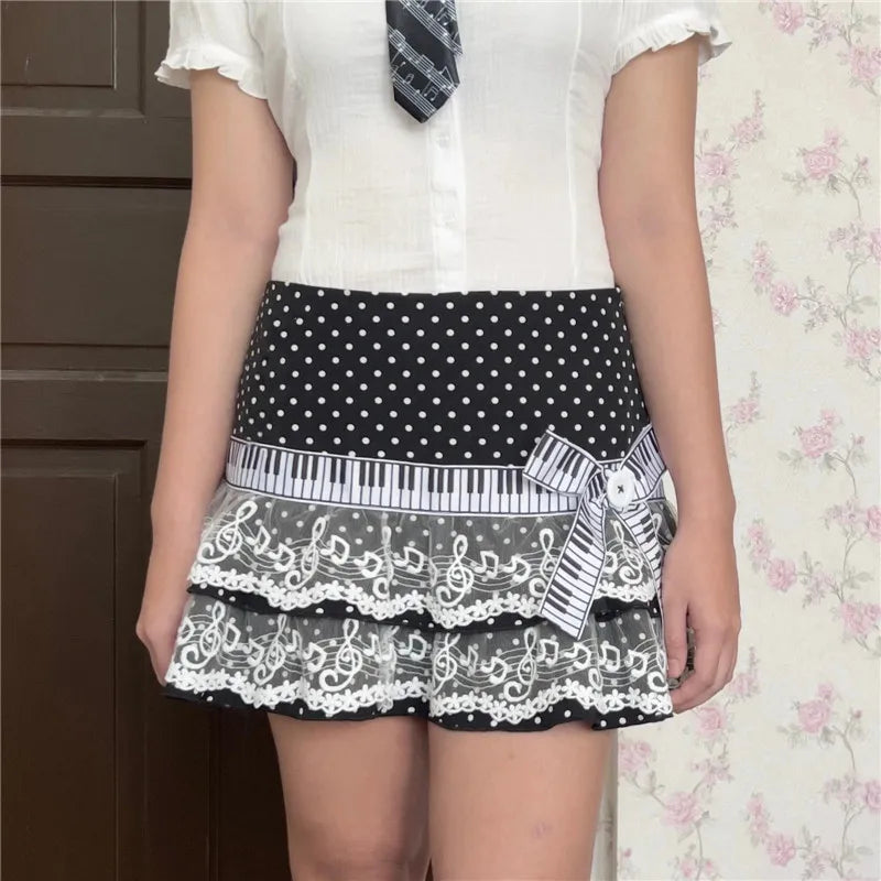 Thilde Polka Dot Lace-Tier Piano-Key Mini Skirt One-piece