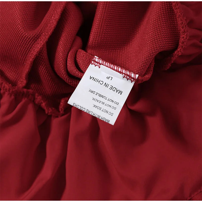 Perpetua Red Halter-Tie Sweetheart Peplum Top One-piece
