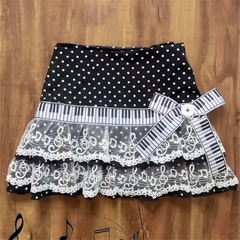 Thilde Polka Dot Lace-Tier Piano-Key Mini Skirt One-piece