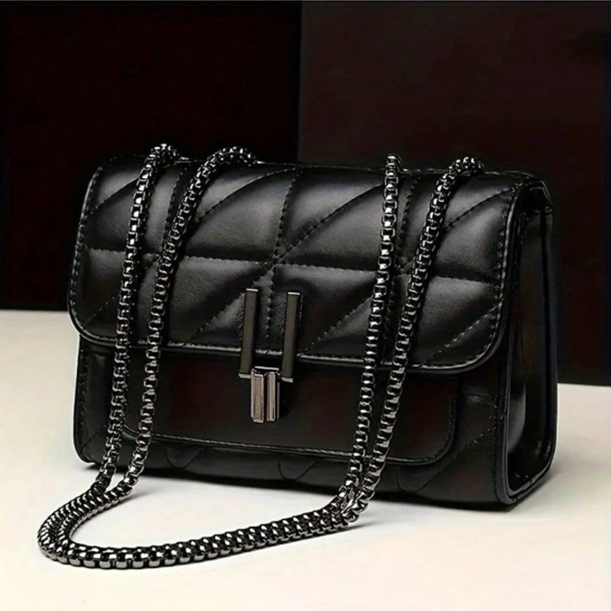 Noir Quilted Tassel Messenger Bag