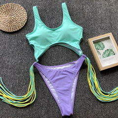 Splicing High Cut Out One Piece Tassel Swimwear